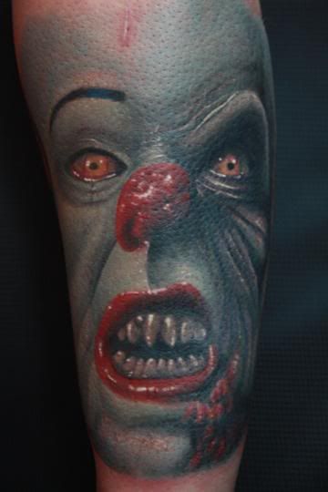 last and not least my fav tattoo i have pennywise the clown portrait done by 