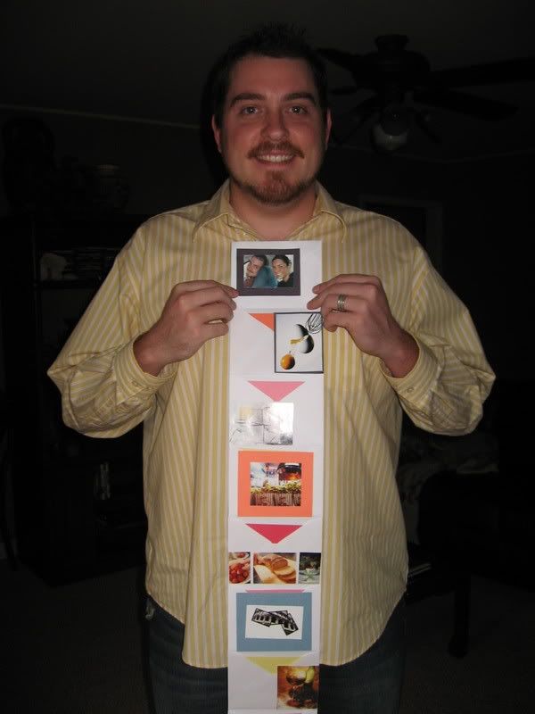 Daniel holds his 3 year anniversary card.