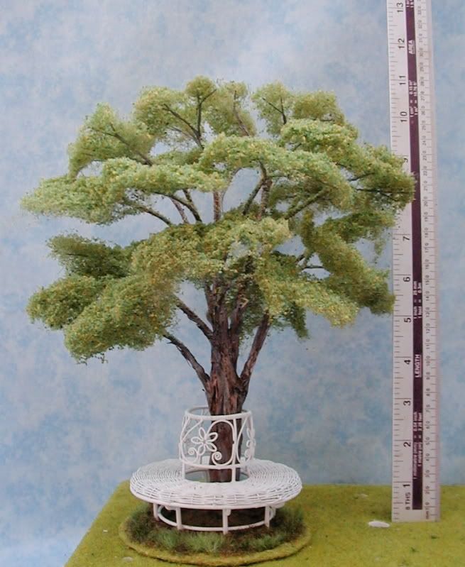 CDHM Gallery of Ceynix Miniature Trees 'n' Trains creating 1:12 trees, tree with garden seat, landscaping, stand of trees with stag deer, for the dollhouse miniature collector, HO railroad collector, and wargaming setting