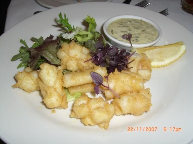 Calamari with dip. man the sauce was soooooo delicious, Wayne and I had everyones haha