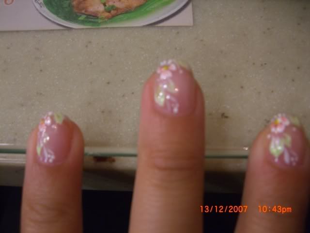 My nails with flower decorations lol cheap!!