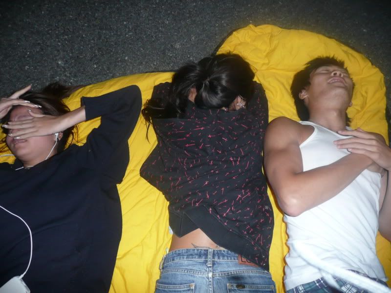 lying OUTSIDE of the car where we slept on the first night lol