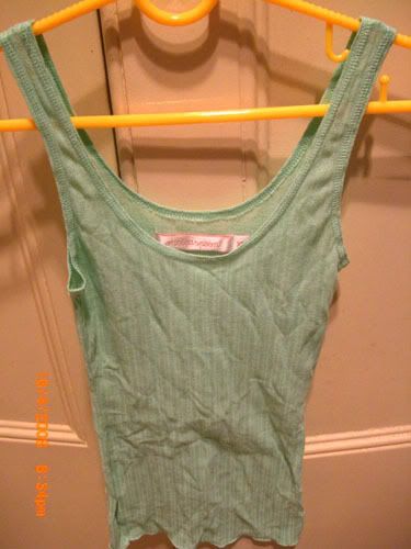 Bright green tight fitting singlet