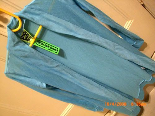 Bright blue long cardigan, haha the picture makes it look like a blue priest cape haha