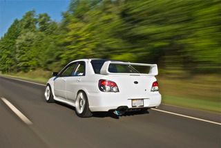 http://i30.photobucket.com/albums/c344/xwalnutx/DSC_0399sti.jpg